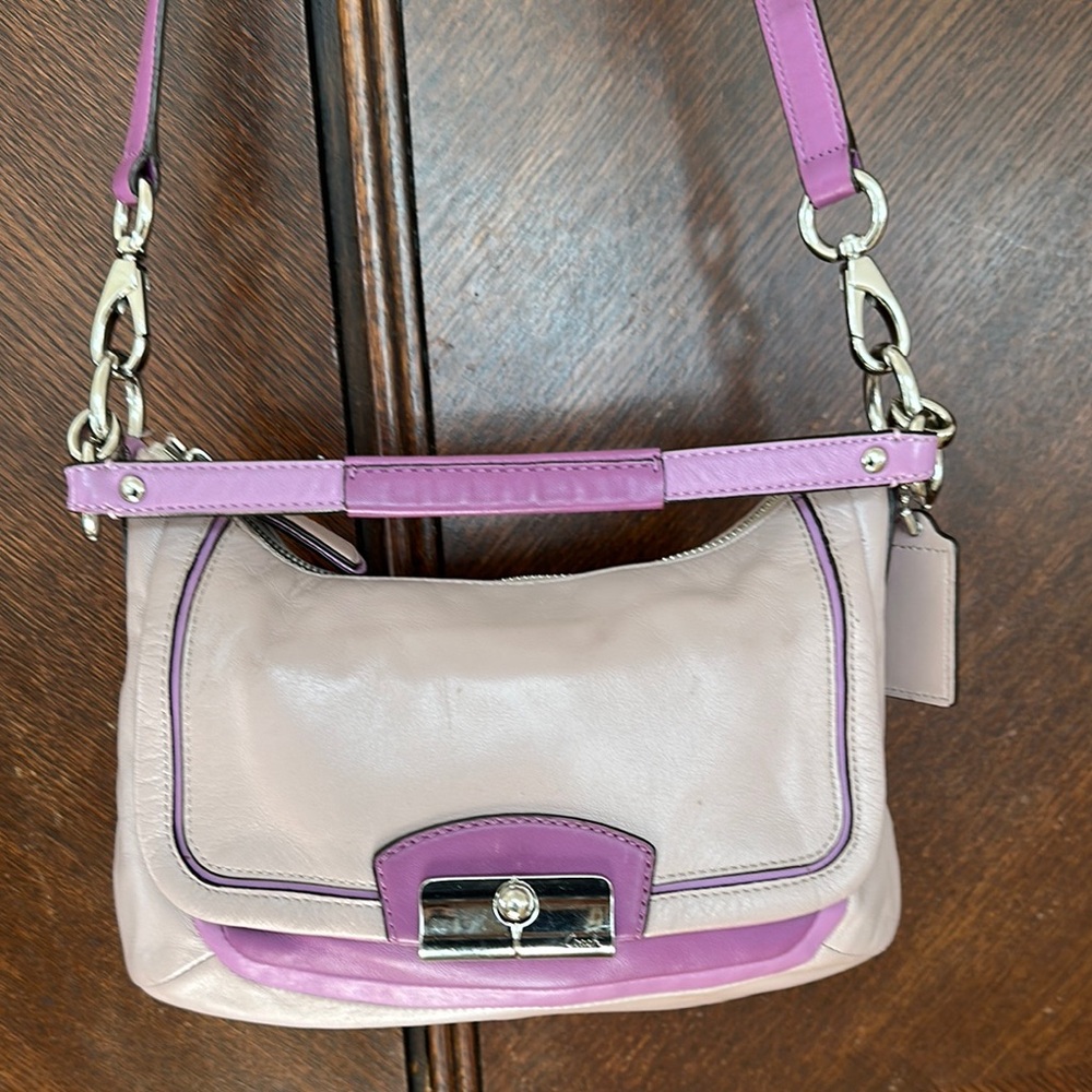 Elegant lilac and Purple Coach crossbody leather bag
